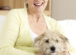 Older Woman with Dog on Lap